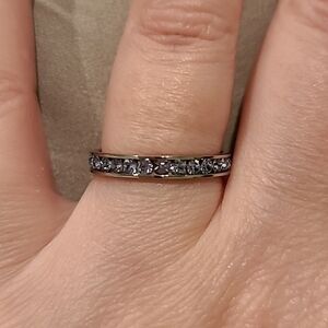 Light blue cubic zirconia channel set eternity stainless steel ring